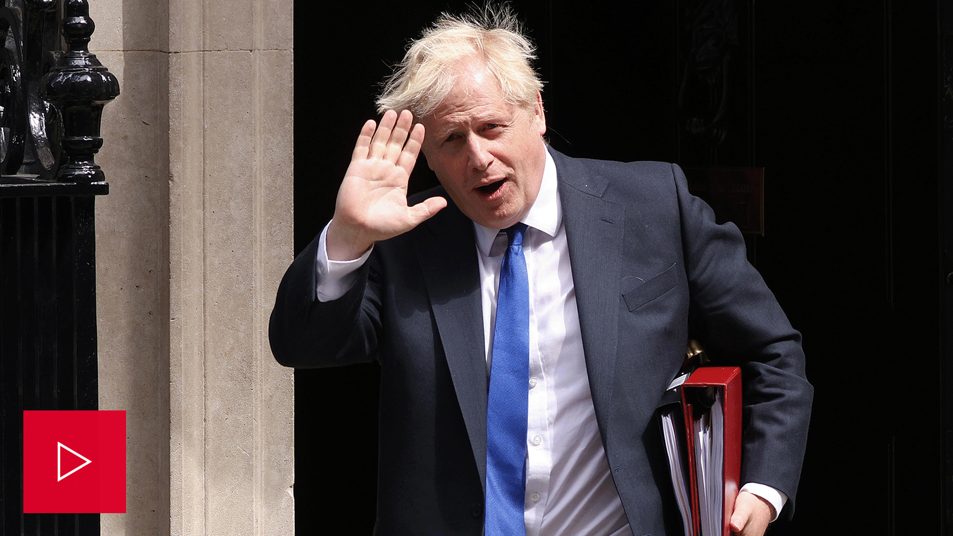 British Prime Minister Boris Johnson waves.