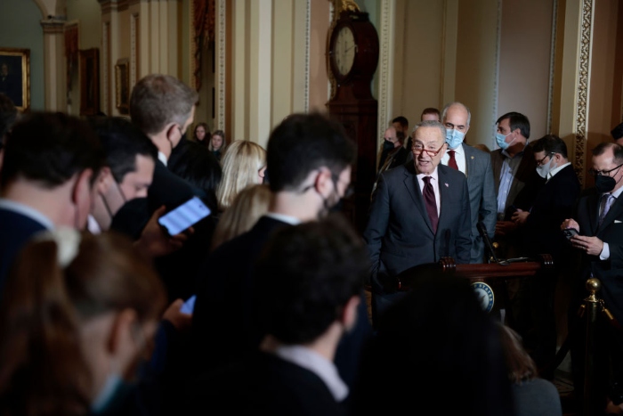 Nightly 12-13-21 photo Senate Majority Leader Chuck Schumer speaks at a news conference at the U.S. Capitol.