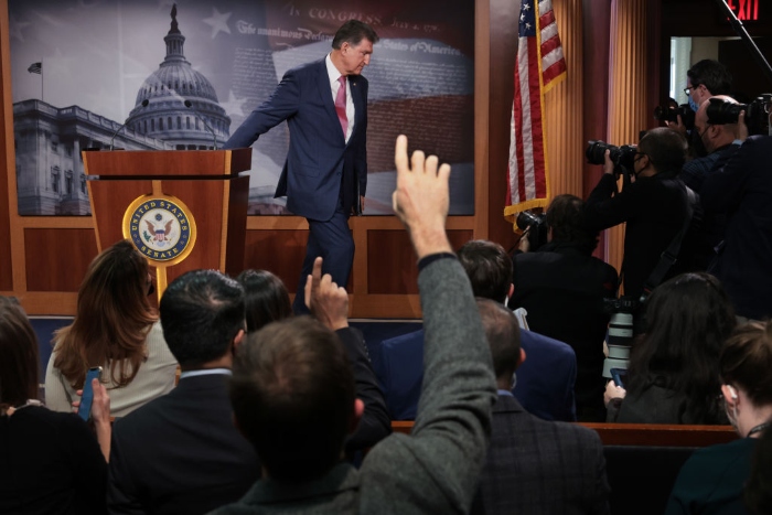 Nightly 11-1-21 photo Sen. Joe Manchin (D-W.Va.) steps away from the lectern after talking to reporters at the U.S. Capitol.