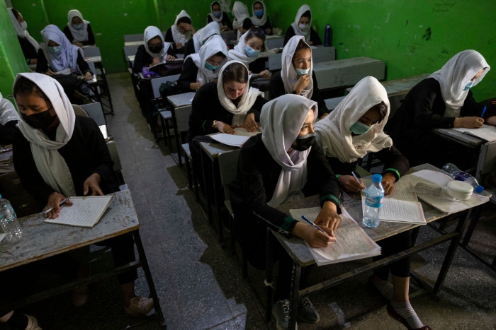 Nightly 8-18-21 photo Afghan female students listen during 10th grade class at the Zarghoona high school on July 25 2021 in Kabul, Afghanistan.