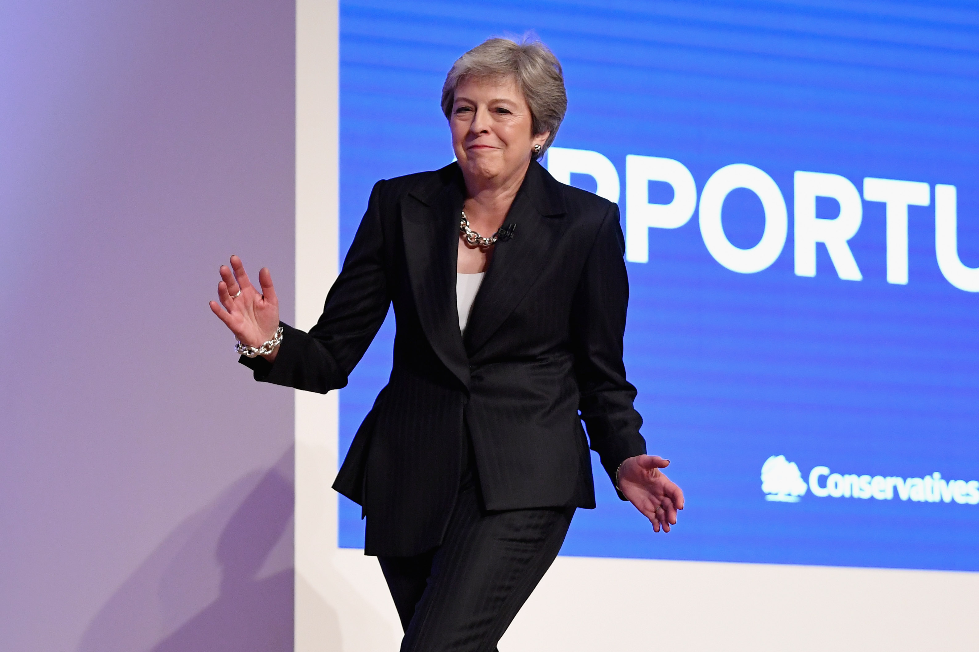 A photo of Theresa May dancing.