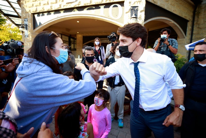 Nightly 9-16-21 photo 3 Canadian Prime Minister and Liberal leader Justin Trudeau greets a constituent during a campaign stop in Port Coquitlam, Canada.