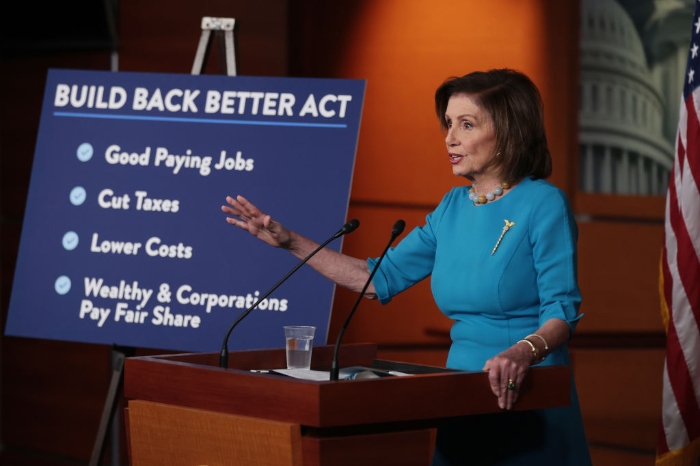 Nightly 11-22-21 photo top Speaker of the House Nancy Pelosi talks to reporters during her weekly news conference in the U.S. Capitol Visitors Center.