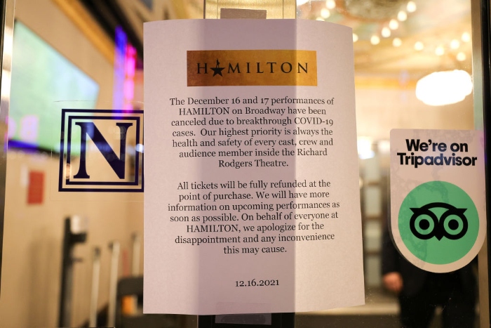 Nightly 12-17-21 photo 3 A sign indicating canceled performances hangs at the front entrance of