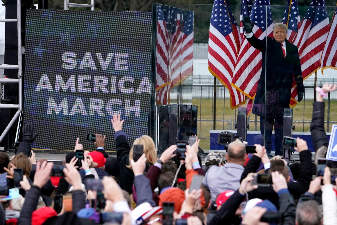 Then-President Donald Trump arrives to speak at a rally.