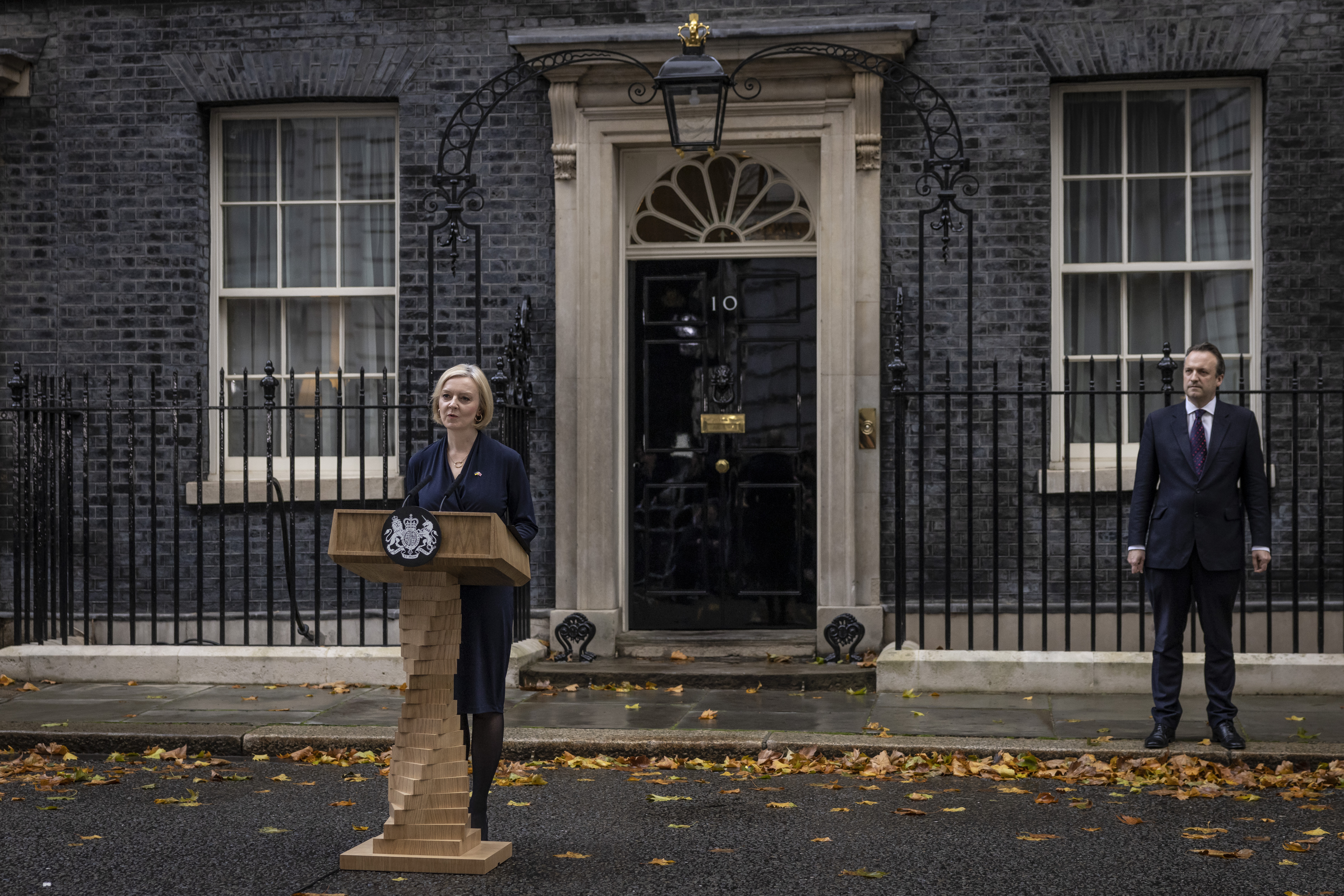 A photo of Liz Truss speaking outside 10 Downing Street.