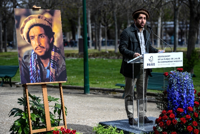 Nightly 8-19-21 photo 6 Ahmad Massoud, son of late Afghan commander Ahmad Shah Massoud, delivers a speech next to a portait of his father during a ceremony to unveil a commemorative plaque of late Afghan anti-Taliban commander Massoud in an alley along the Champs Elysees Avenue in Paris in March.
