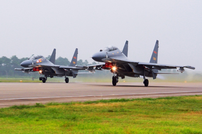 Nightly 10-5-21 photo 2 Two Chinese SU-30 fighter jets take off from an unspecified location to fly a patrol over the South China Sea.