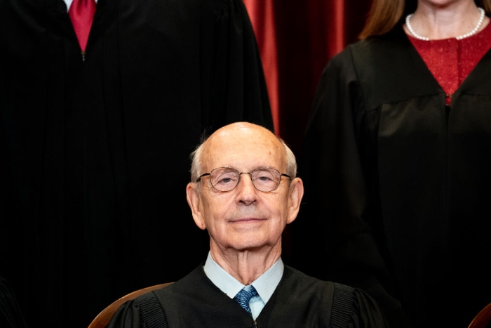 Nightly 1-26-21 photo Associate Justice Stephen Breyer sits during a group photo of the Justices at the Supreme Court.