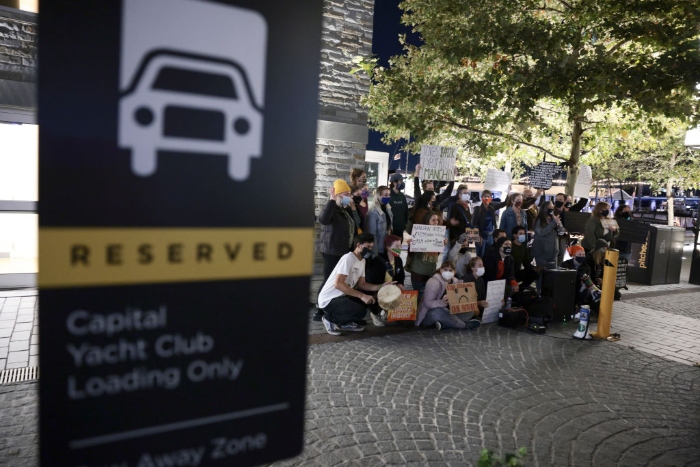 Nightly 10-19-21 photo 2 Climate activists with the group Shutdown DC protest at The Wharf near Sen. Joe Manchin’s yacht in Washington.