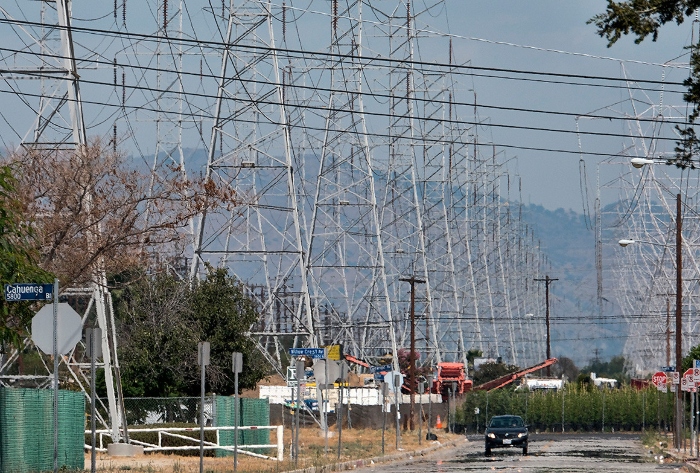 Heat rises from a street under high tension electrical lines in the North Hollywood section of Los Angeles. 