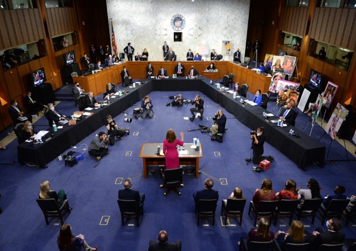 Nightly 10-13 photo Supreme Court Justice nominee Judge Amy Coney Barrett is sworn in during the Senate Judiciary Committee confirmation hearing on Capitol Hill.