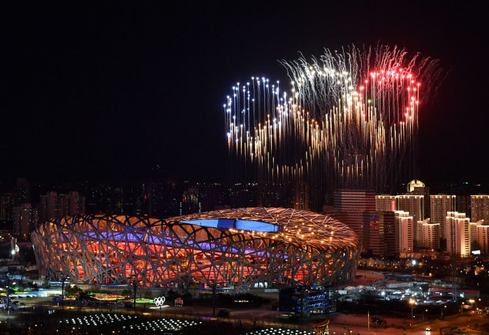 Nightly 2-4-22 photo 2 Fireworks in the shape of the Olympic rings go off over the National Stadium, known as the Bird's Nest, in Beijing, during the opening ceremony of the Winter Olympic Games.