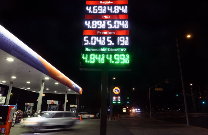 Gasoline prices are displayed at a gas station in Los Angeles.