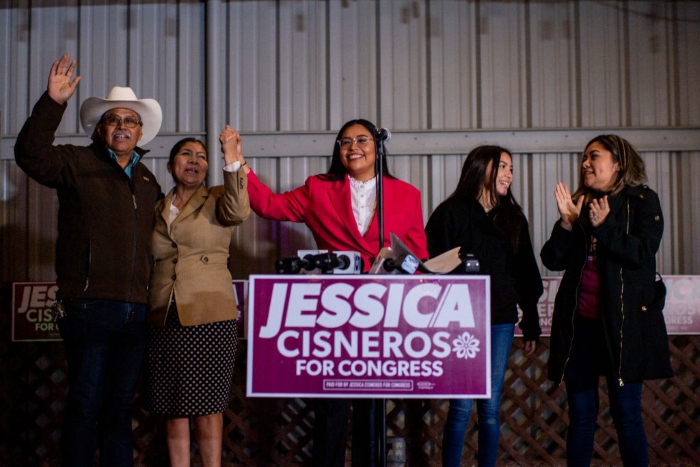 Democratic U.S. congressional candidate Jessica Cisneros concludes a speech alongside her family in Laredo, Texas.