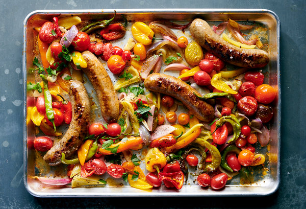 Sheet-Pan Sausage With Peppers and Tomatoes