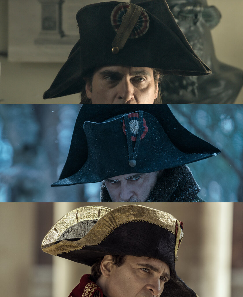 In three images running from top to bottom, close-ups of three different bicorn hats worn by Joaquin Phoenix hi his role as Napoleon.