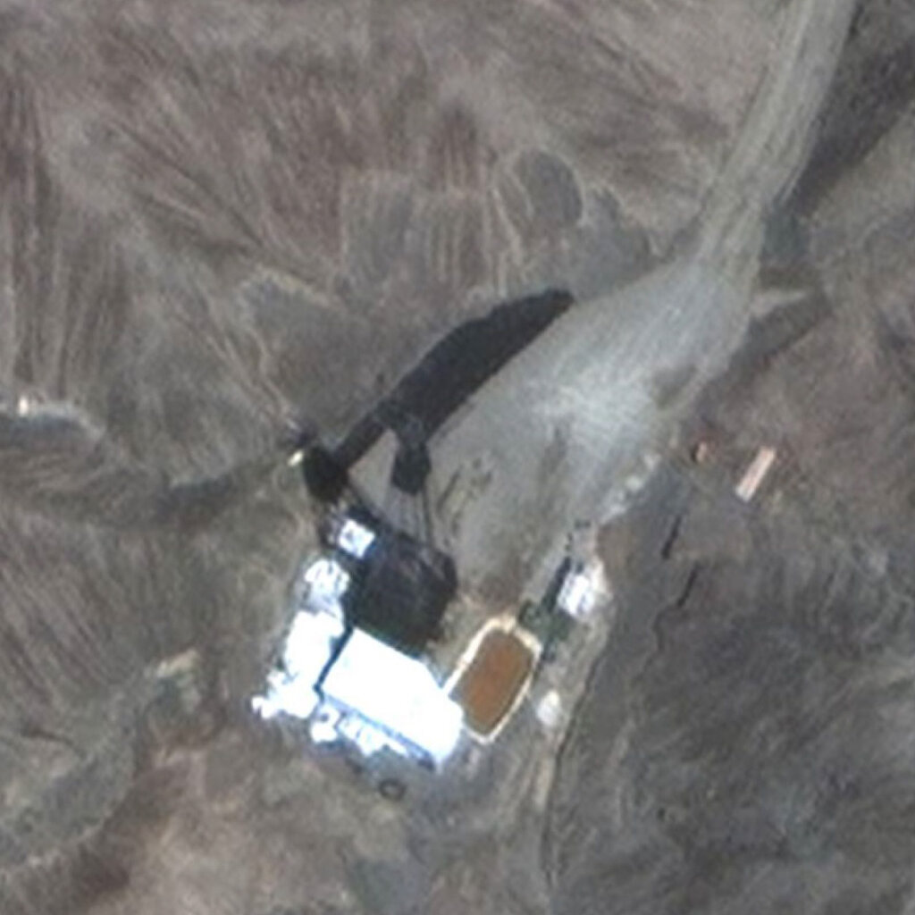 A satellite image of a military base in a desert.
