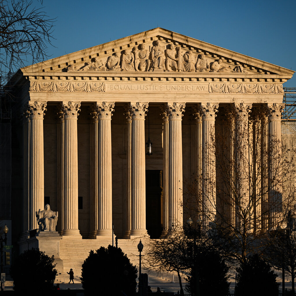 The exterior of the U.S. Supreme Court at sunset. 