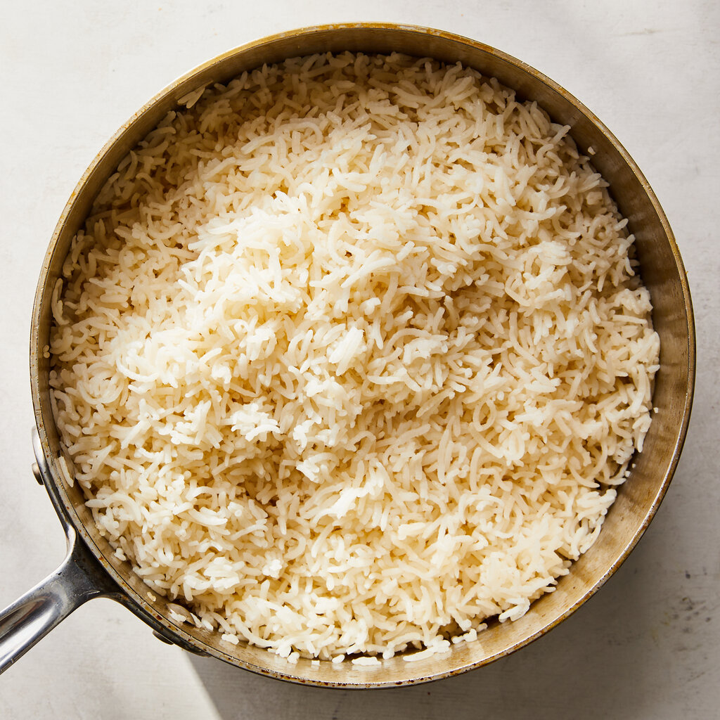 Top down view of a butter pilaf in a pan.