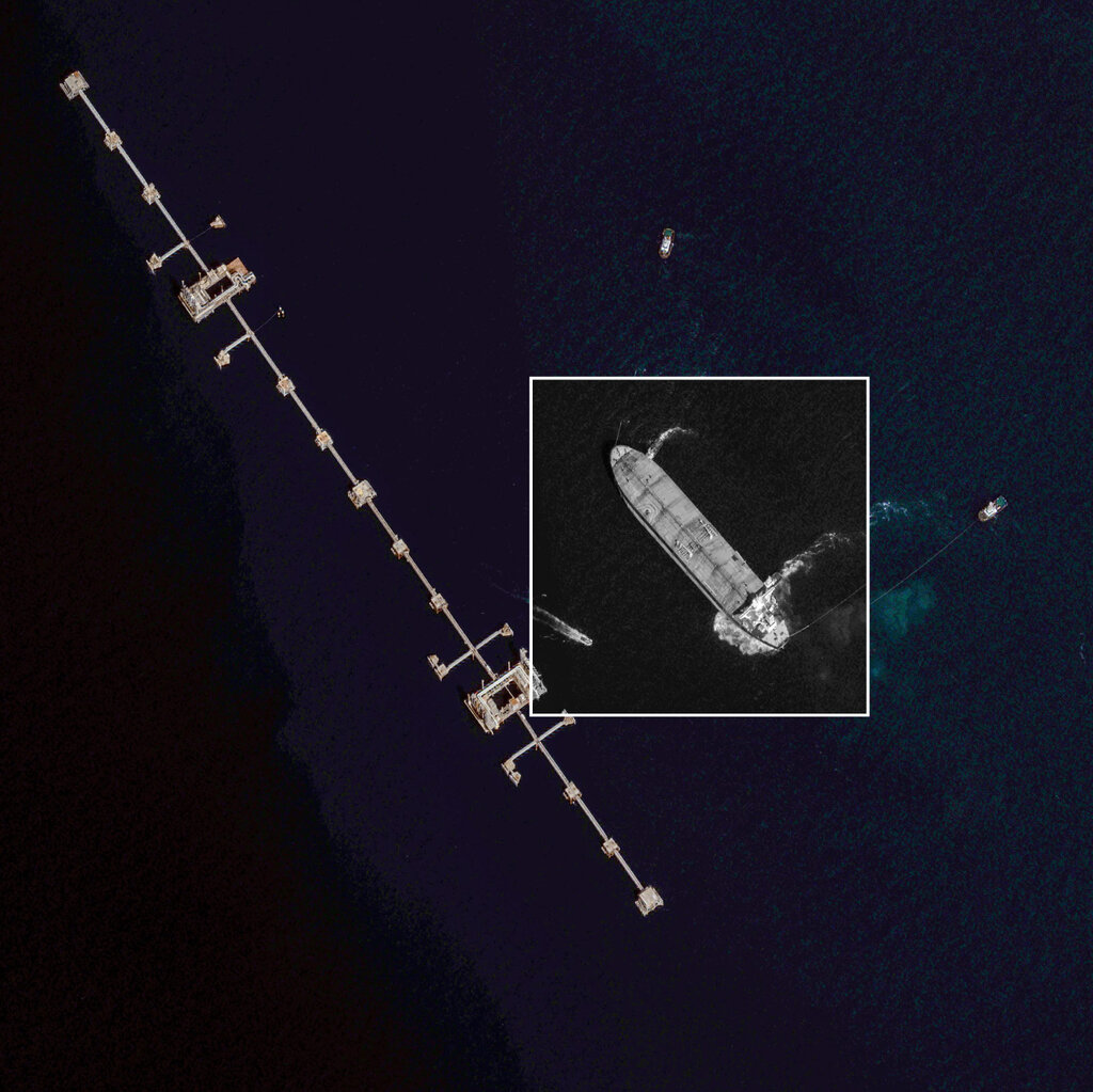 A satellite image of an oil tanker in the ocean. 