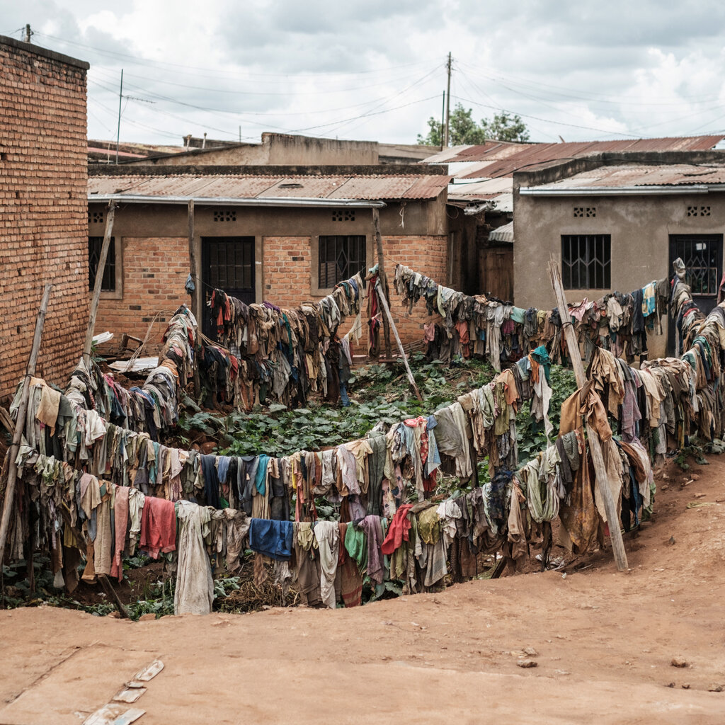 The clothing of victims displayed outside some houses.