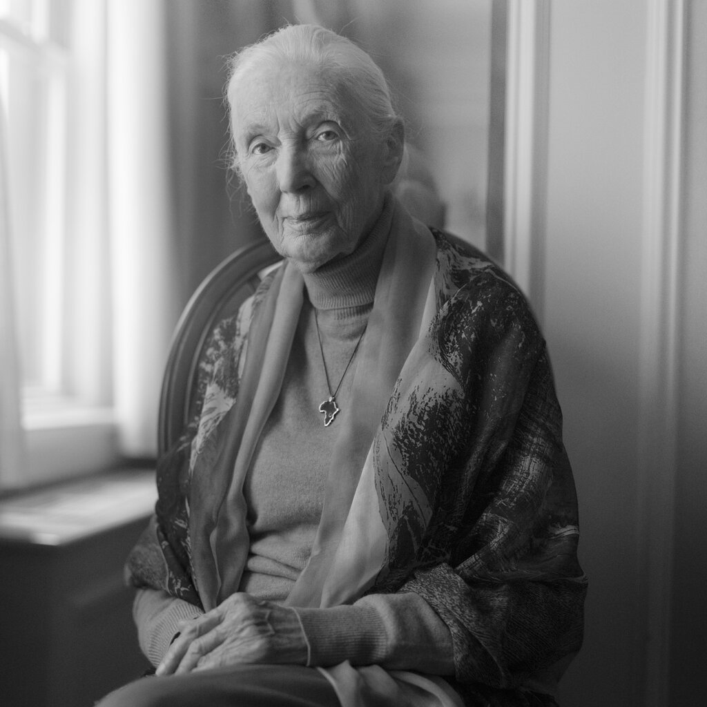A black and white photograph of Jane Goodall. 