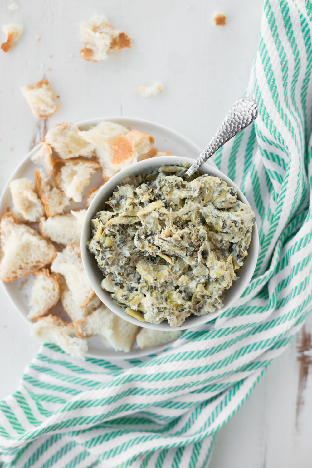 Rich, creamy, and oh-so delicious, Slow Cooker Spinach Artichoke Dip (Dairy-Free, Gluten-Free) will be the hit of your next party or gathering! #realfoodwholelife #healthy #recipe #realfood #cleaneating #glutenfree #dairyfree #soyfree #grainfree #paleo #whole30 #instantpot #crockpot #vegetarian #vegan