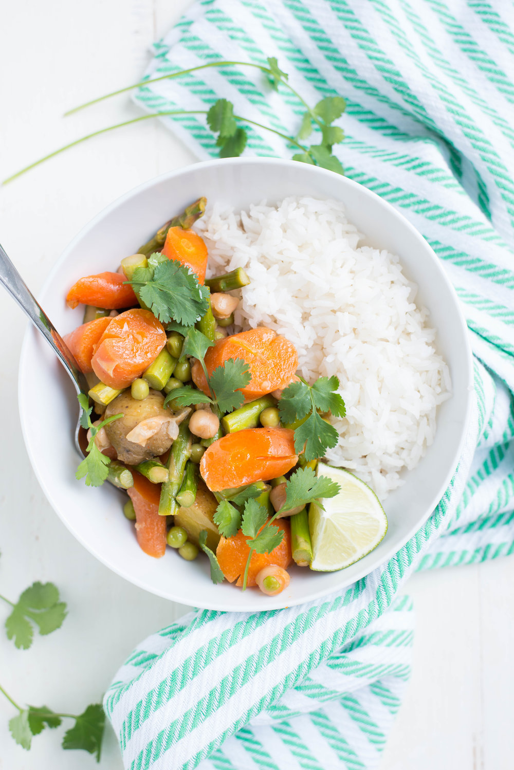 Bursting with vibrant spring vegetables, Slow Cooker Spring Veggie Coconut Curry is easy to pull together and is the perfect dinner, any night of the week.