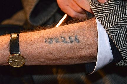 People were stripped of their identity when they entered the camps, and a number was tattooed on their arm.