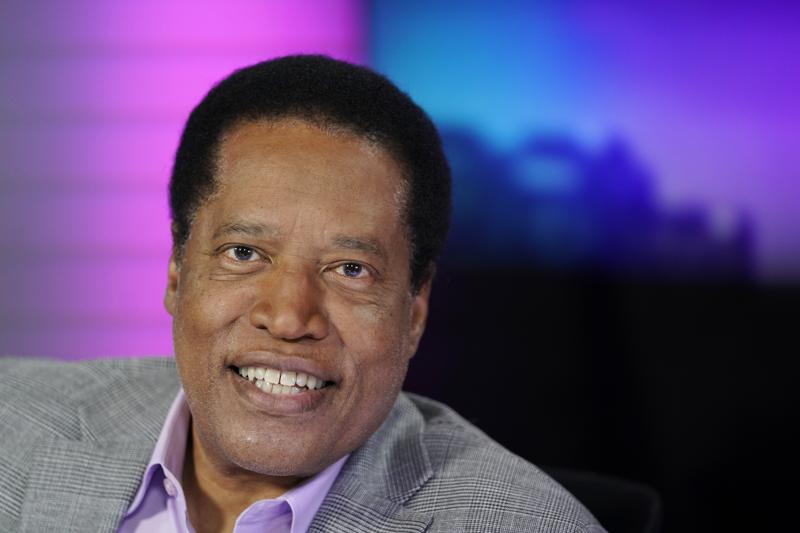 Radio talk show host Larry Elder poses for a photo in his studio, Monday, July 12, 2021, in Burbank, Calif. Elder has announced he is running for governor of California. (AP Photo/Marcio Jose Sanchez)