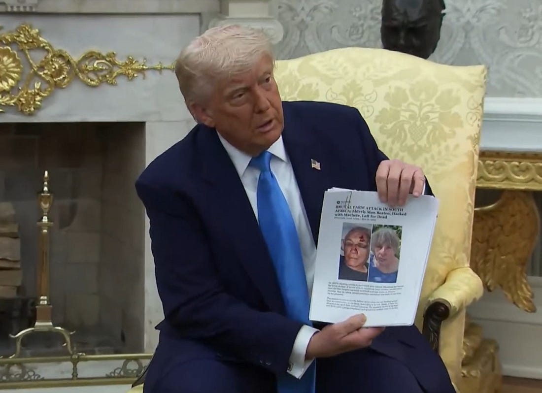 Trump holding up a Facebook post "article" Trump holding up a Facebook post "article"