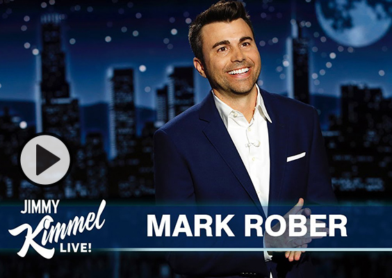 A smiling Mark Rober guest hosts on the set of Jimmy Kimmel Live.