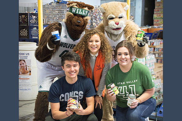 Cosmo COugar and Willy the Wolverine join students to promote the Valley Against Hunger BYU UVU food drive November 6 to 19.