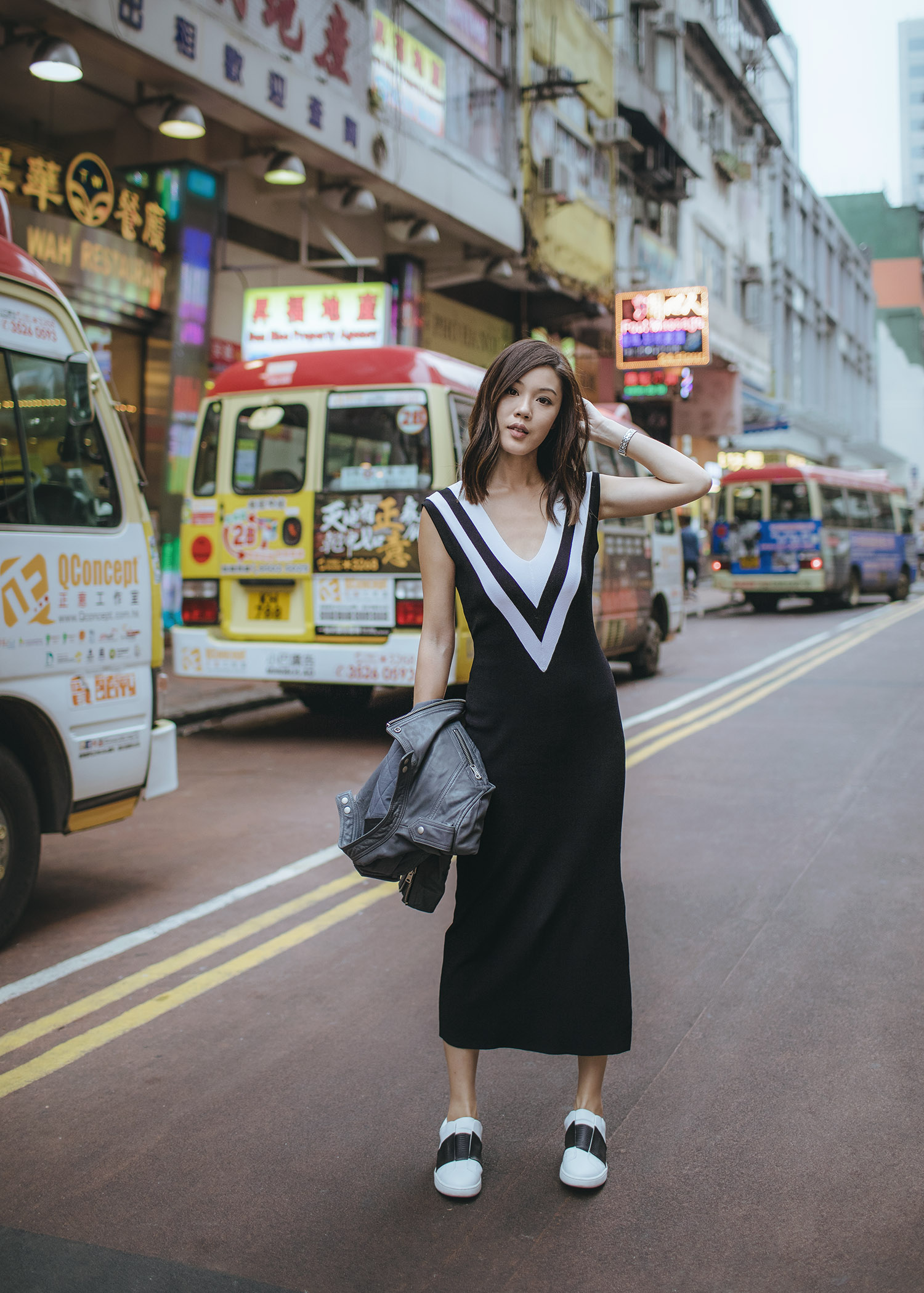 Street style fashion blogger influencer Jenny Tsang of Tsangtastic wearing RAG & BONE Daphne Varsity Sweater Dress and VINCE Sneaker with black bend, in Hong Kong.
