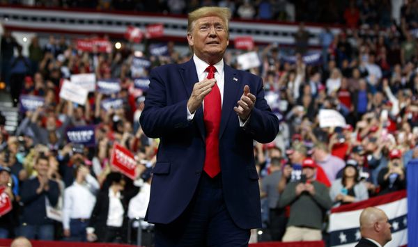 President Donald Trump arrives to speak at a campaign rally at the Target Center, Thursday, Oct. 10, 2019, in Minneapolis. (AP Photo/Evan Vucci)