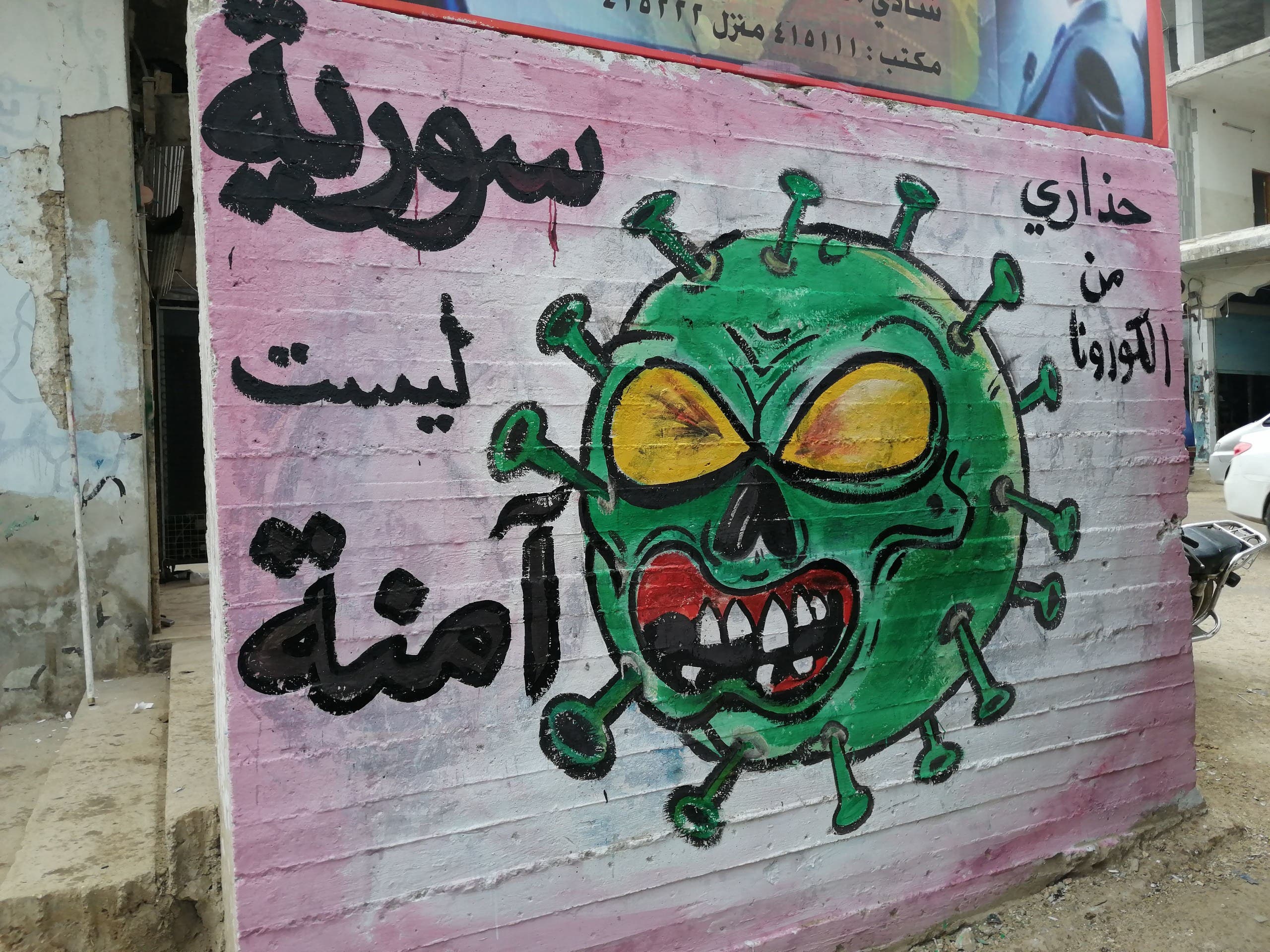 Coronavirus: Syrian artist paints murals in war-torn Idlib to warn ...