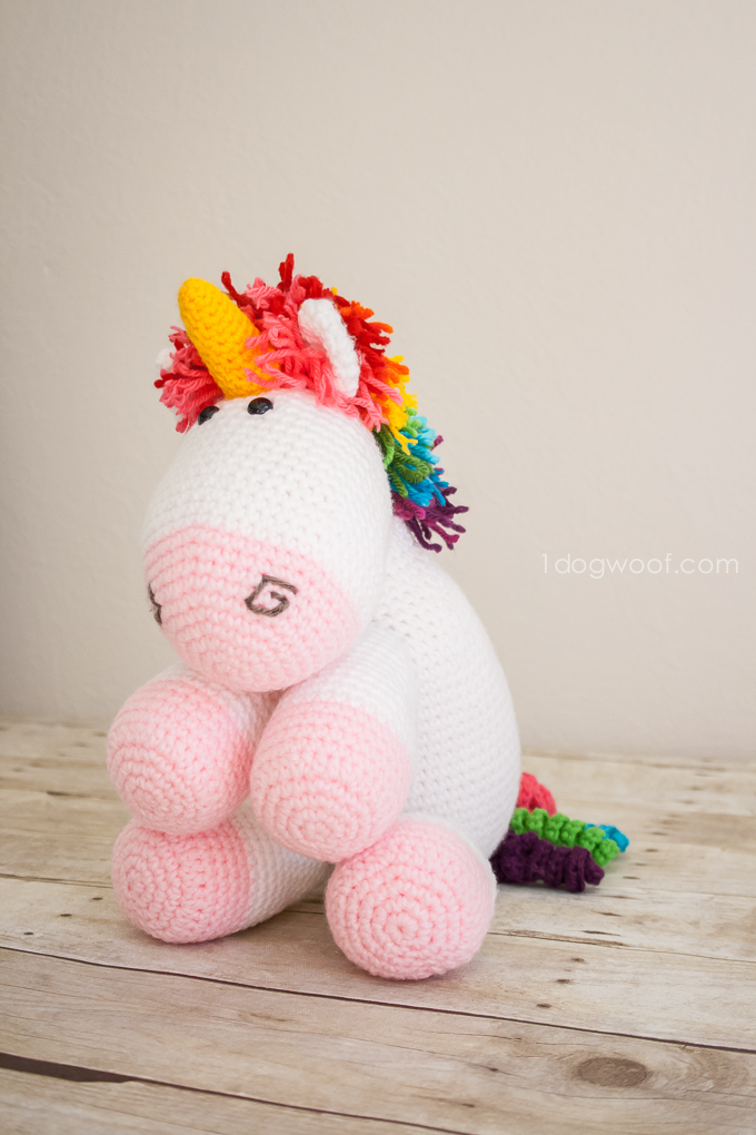 Who wouldn't want this adorable and colorful crochet unicorn? Free pattern too! | www.1dogwoof.com