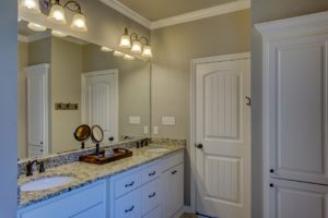 a bathroom with two sinks