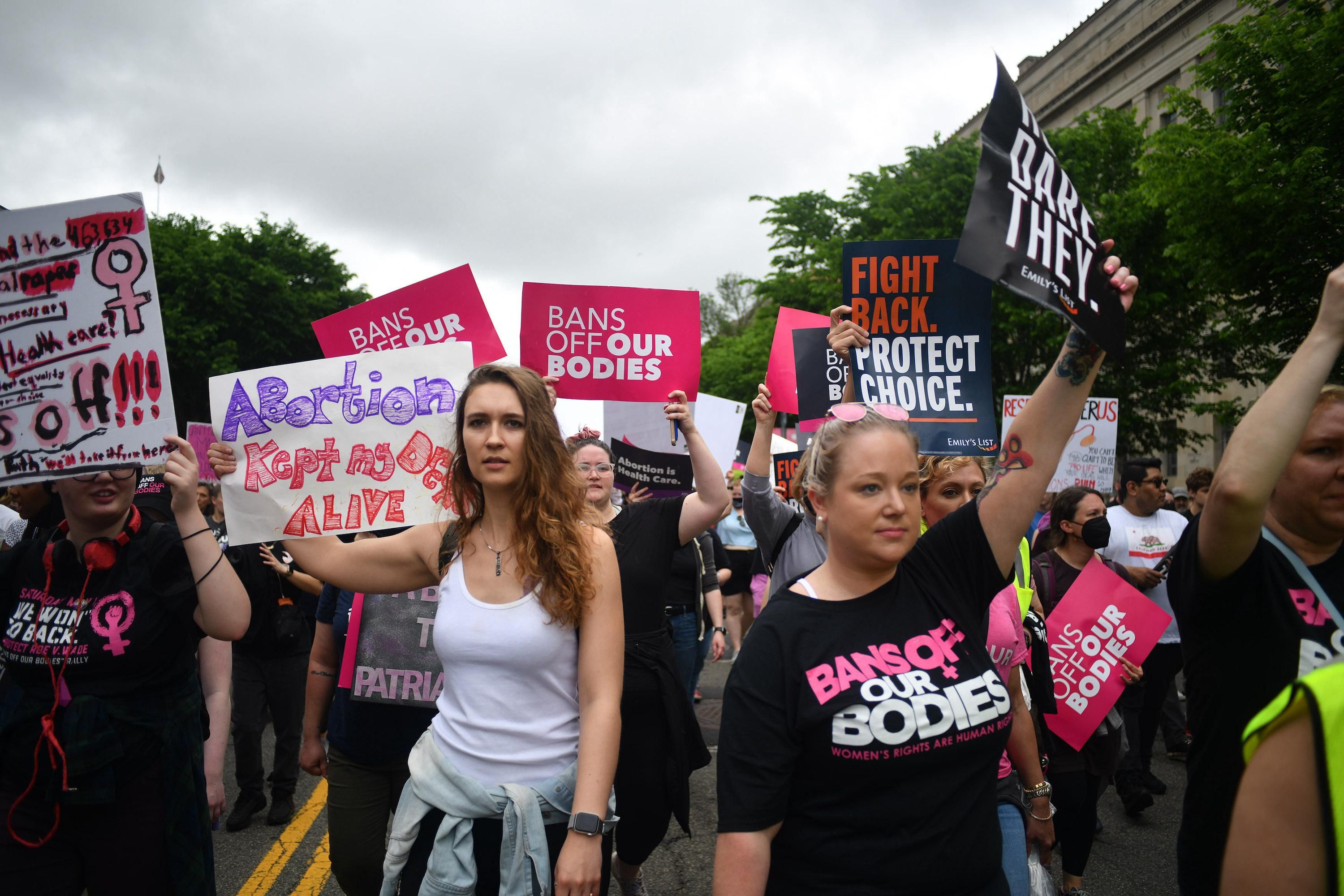Pro-choice activists march along Constitution Avenue to the U.S. Supreme Court in Washington, D.C., May 14, 2022, to declare, 'Bans off our bodies.