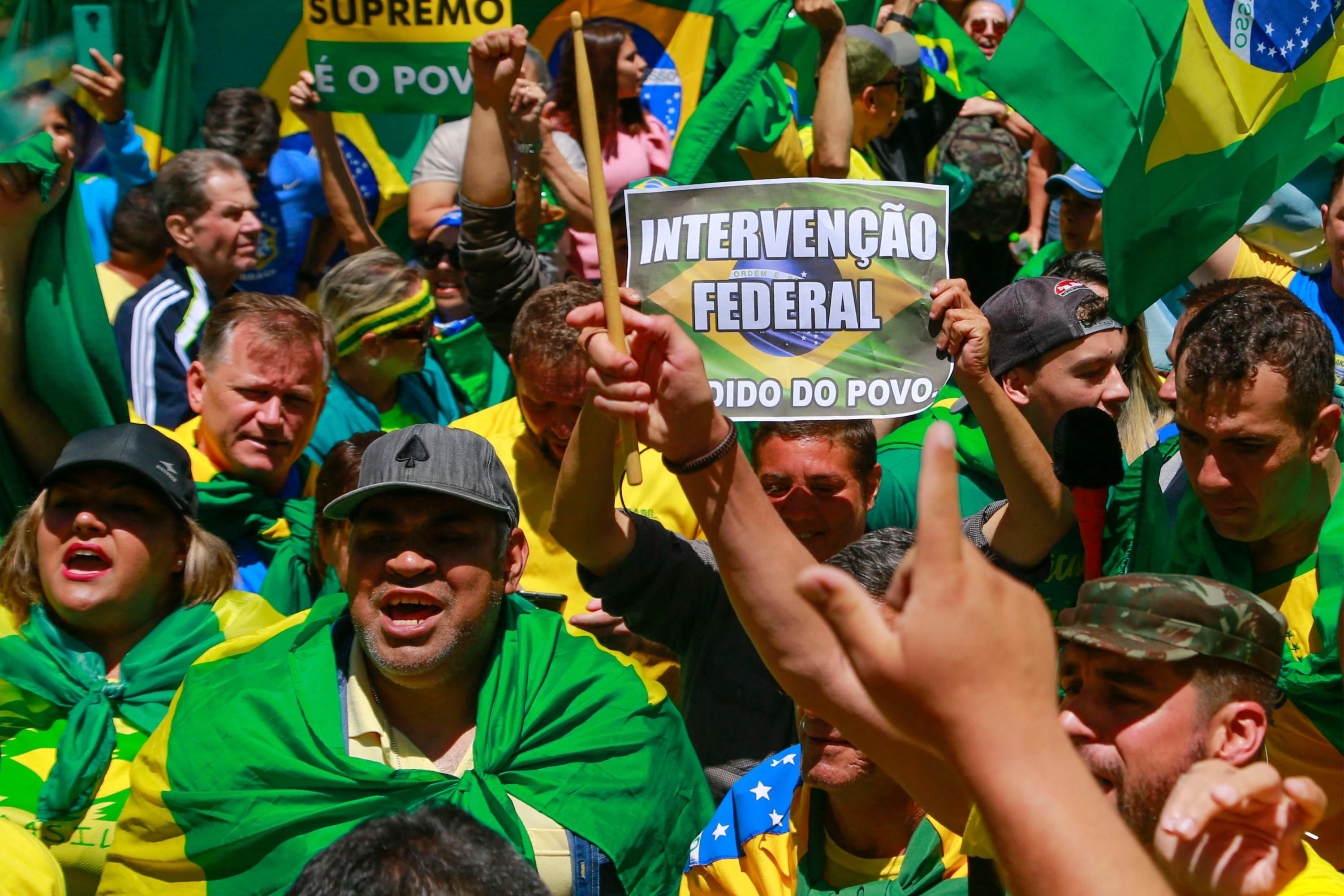 Bolsonaro supporters rally outside of an army building