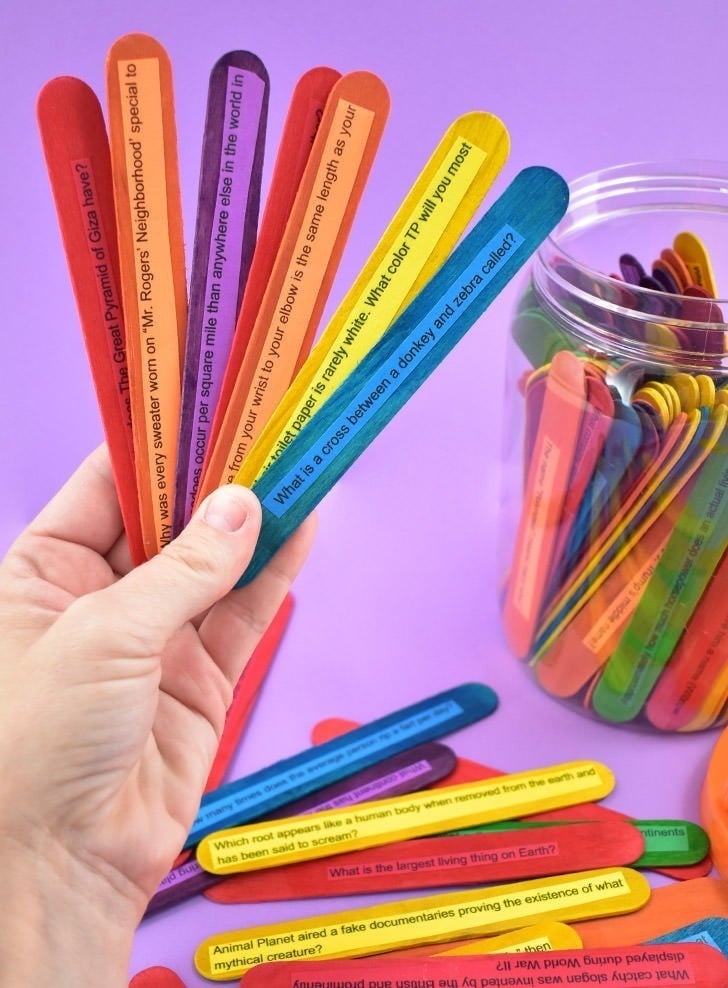 Make a super fun and easy DIY popsicle stick trivia game using whatever genres or categories you please! Plus it easily travels for fun on the go!