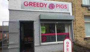 UK: Muslims shout abuse, send warning letter to owner of Greedy Pigs cafe, demanding its name be changed