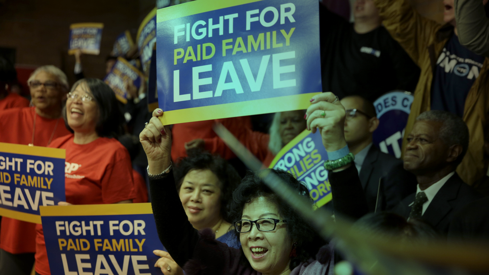 A rally for paid family leave. (AP Photo/Seth Wenig)
