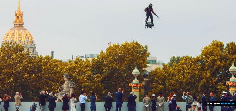French inventor soars above Champs-Élysées on flyboard at Paris parade