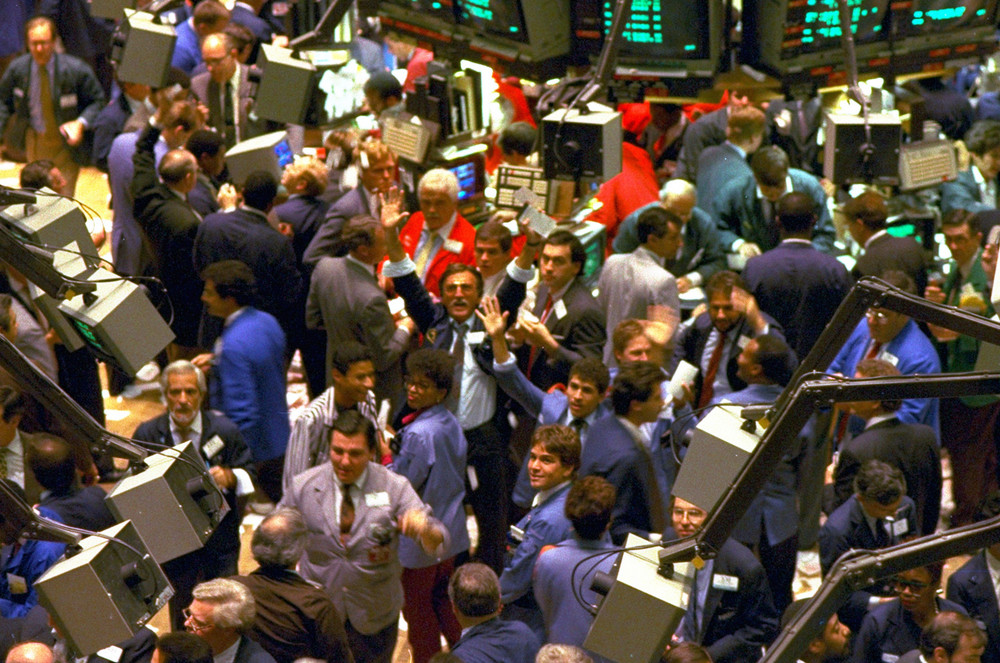 On this date in 1987: Traders on the floor of the New York Stock Exchange work frantically as the Dow Jones Industrial average plunged more than 500 points for a loss of 22.62 percent. It was the biggest one-day loss in history at the time. 