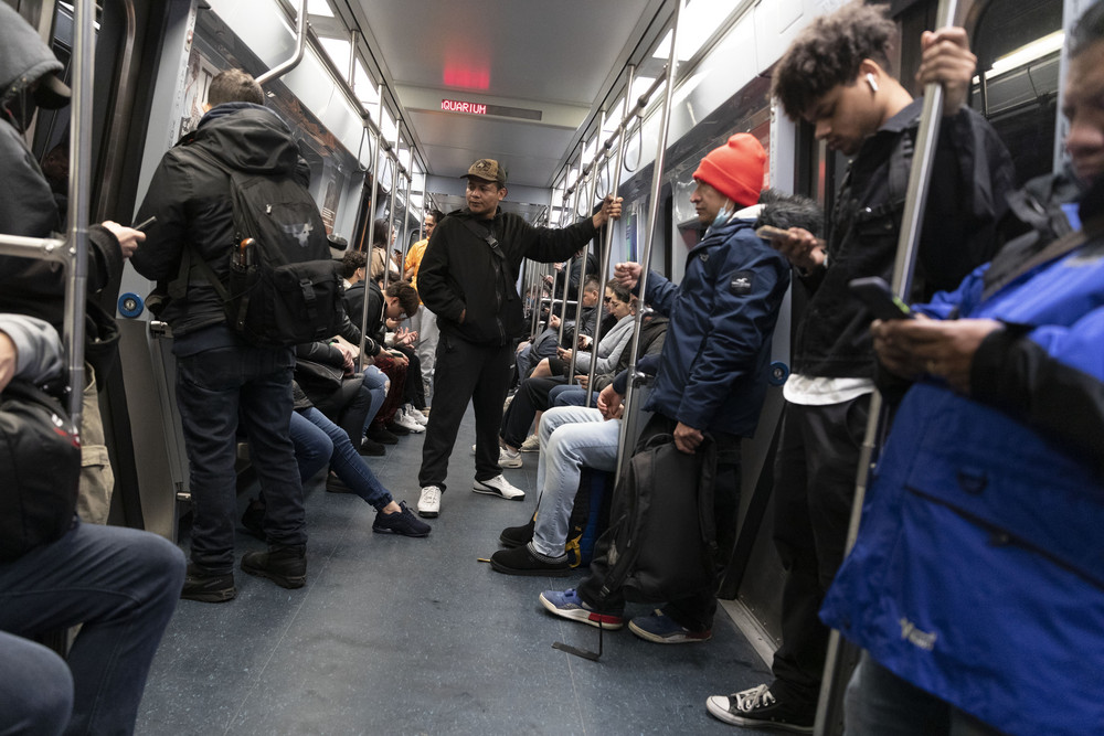 People ride a Blue Line subway train, Friday, March 17, 2023, in Boston. (AP Photo/Michael Dwyer)