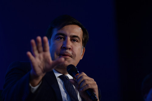 Georgia’s former President Mikheil Saakashvili speaking into a microphone.