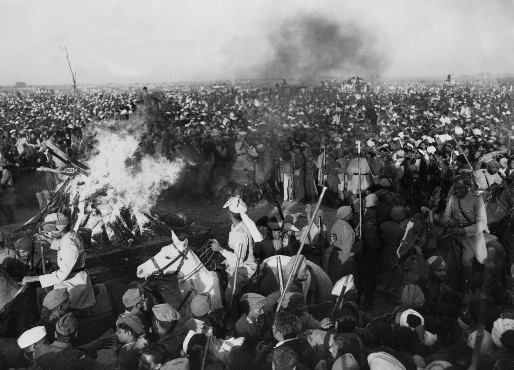 On this date in 1948: Mahatma Gandhi's sandalwood funeral pyre was lit on the banks of the Jumna River in New Delhi, India. Indian soldiers, cavalry and police used their rifles, lathis and clubs to force back the crowd who surged forward after the pyre was lit, as violence touched off by his assassination flared across the country.