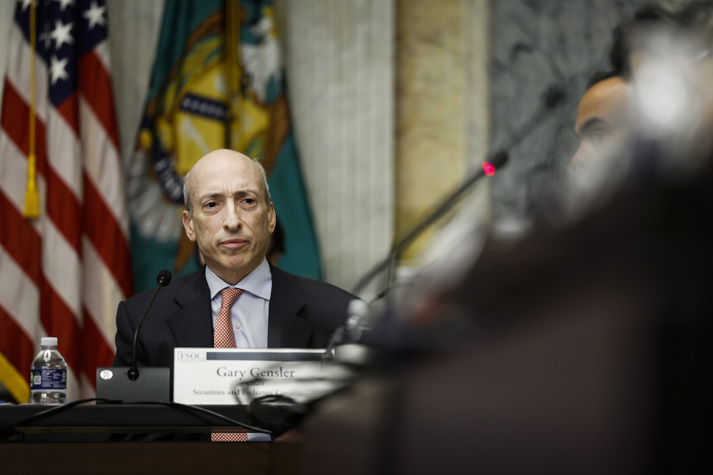 Securities and Exchange Commission Chair Gary Gensler listens during a meeting with the Treasury Department's Financial Stability Oversight Council. 